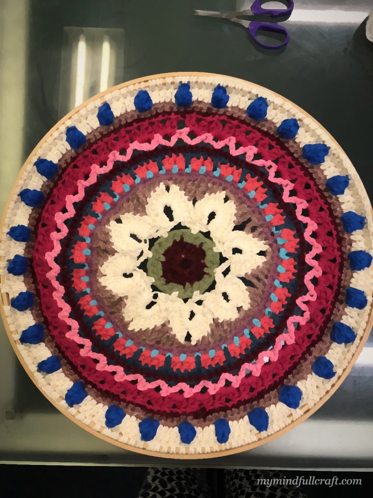 A colourful crocheted circle